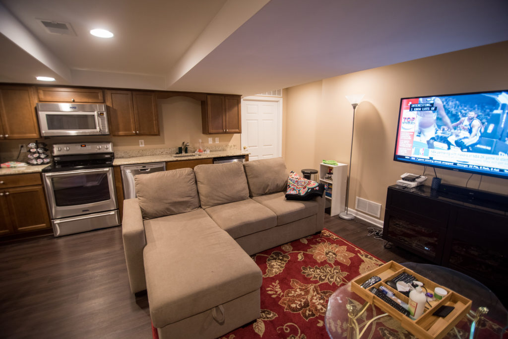 Finished basement in Troy, MI re purposed into space for kitchen and living room