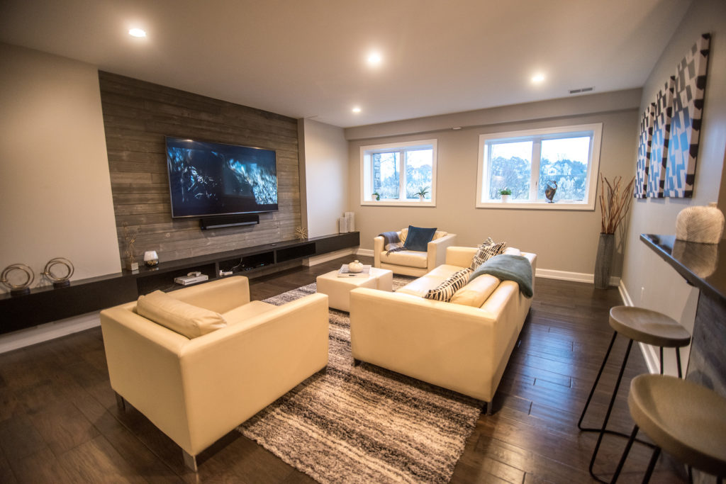 Basement living room with large windows