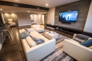 seating area in modern industrial basement design in Commerce, MI