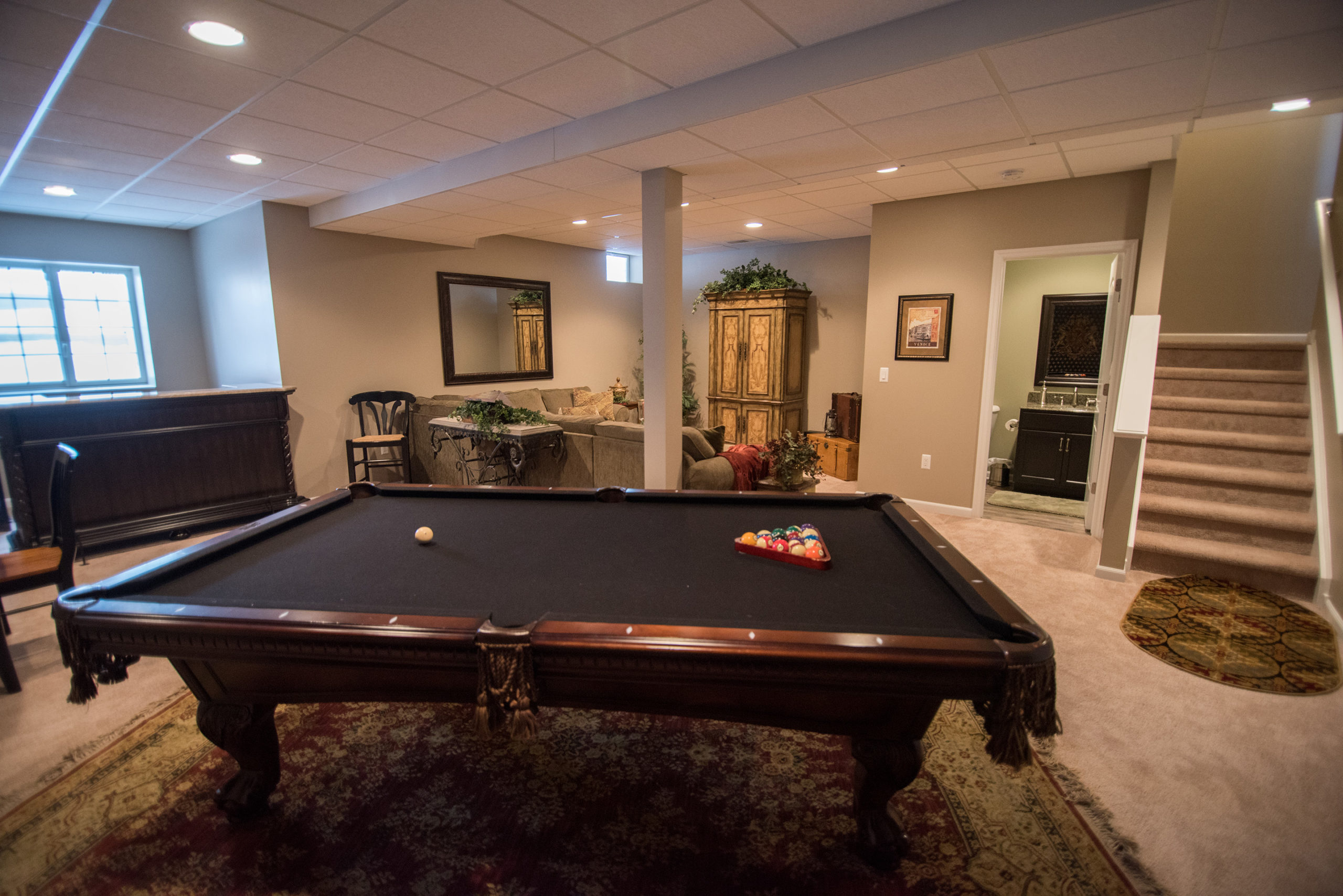 finished basement plus basement with carpet and drop ceiling