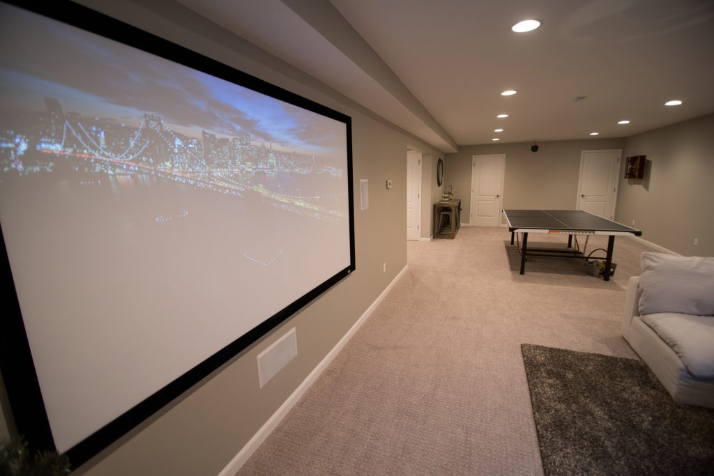 projection tv in finished basement for movies