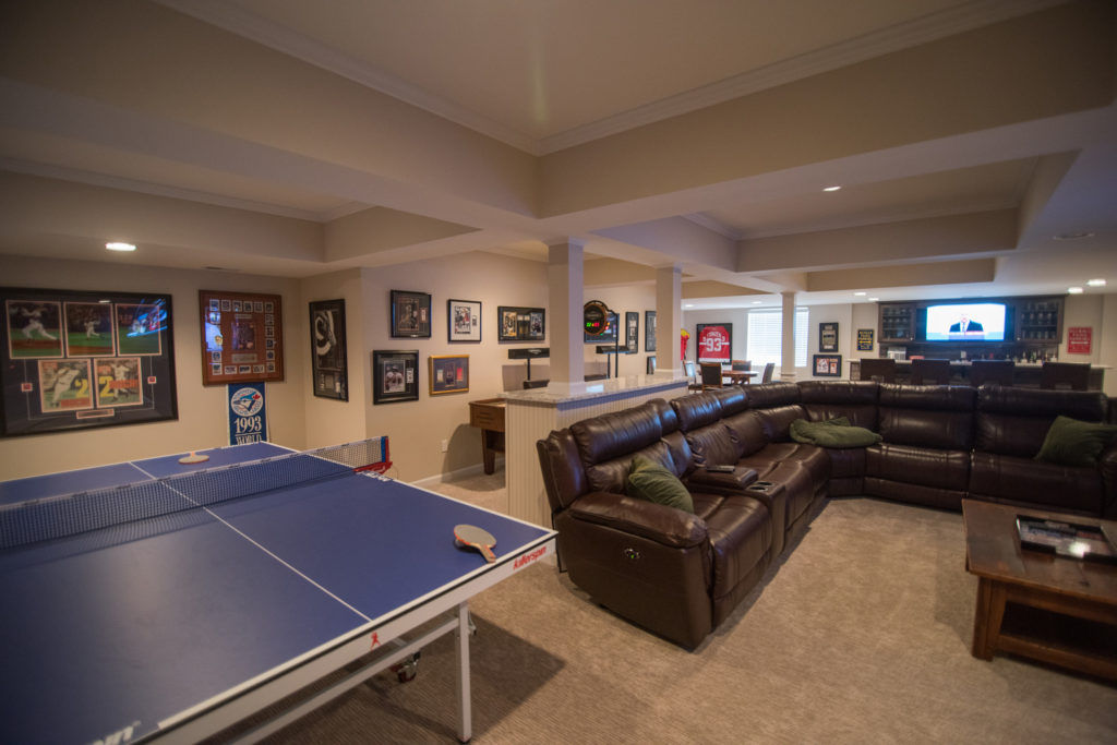 Ceiling detail defining the spaces in this finished basement in Clarkston, Michigan