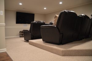 basement theater with platform seating for a good view