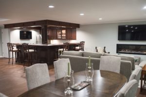 classical basement with vinyl plank flooring