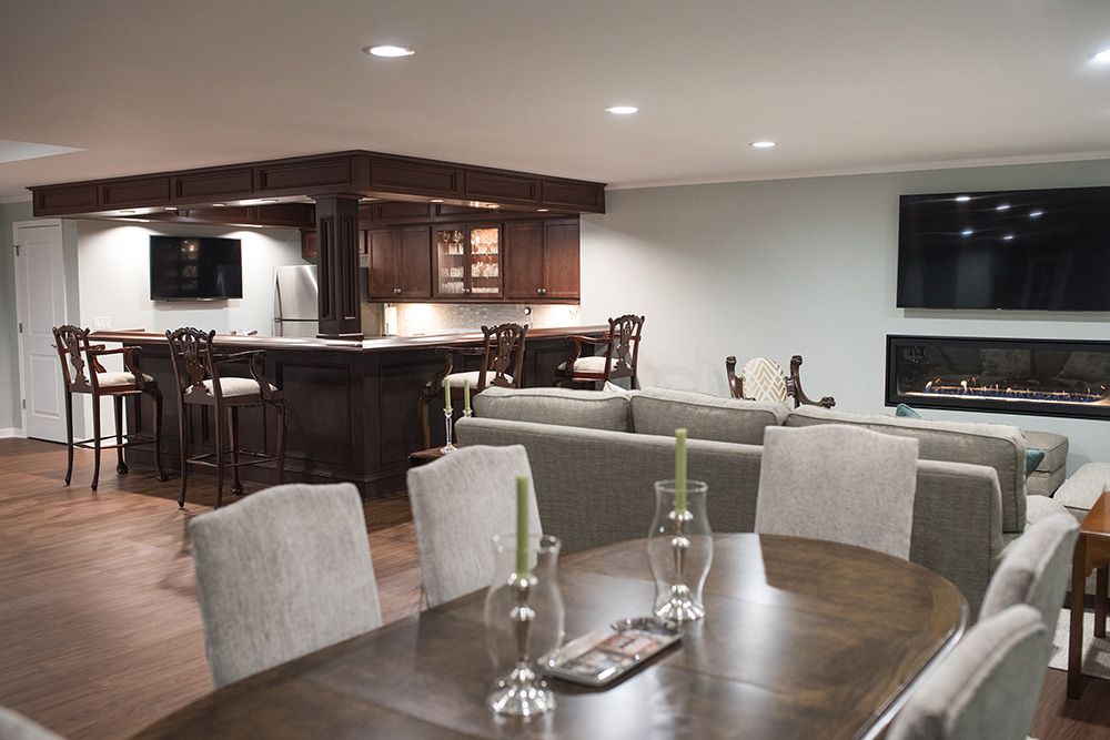 classical basement with vinyl plank flooring