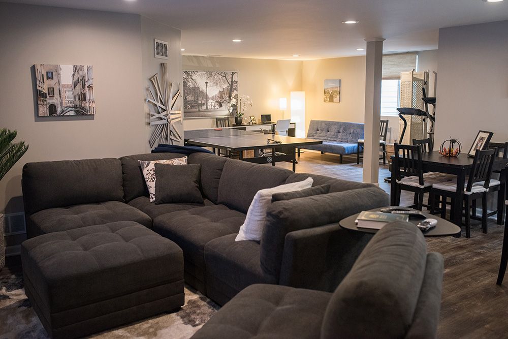 modern finished basement novi dark vinyl plank