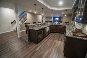 basement bar right at bottom of staircase
