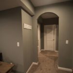 archway design feature in basement hallway in Royal Oak, Michigan