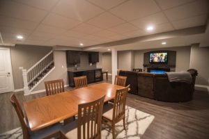 open floorplan in basement with views of every space