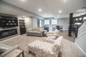 brighton Michigan finished basement with light grey walls and tons of natural light