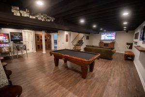 painted ceiling in basement with industrial design