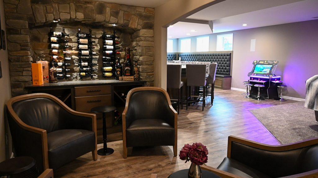 WIne nook area looking out towards the main bar with the view of the stone wine rack wall.