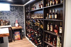 Finished basement wine rack wall in Farmington Hills, Michigan