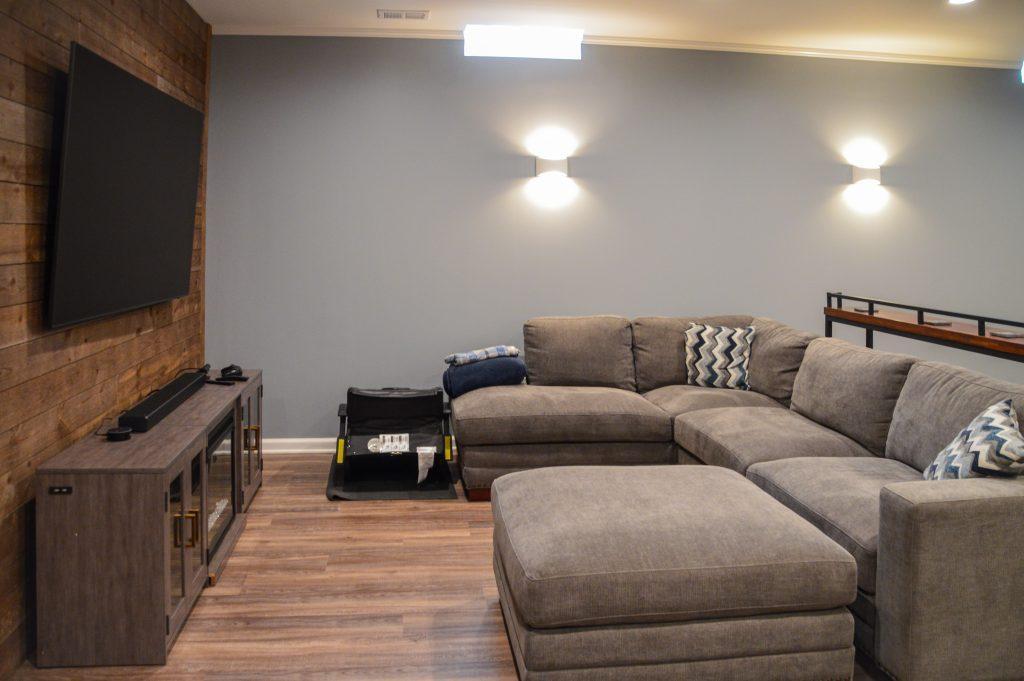Finished basement living room and shiplap tv wall in Berkley, Michigan