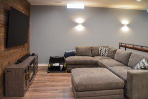 Finished basement living room and shiplap tv wall in Berkley, Michigan