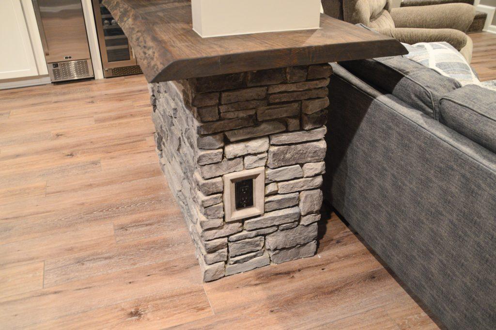 Finished basement brick support post cover in Ann Arbor, Michigan
