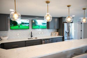 Finished basement home bar quartz countertop in Northville, Michigan