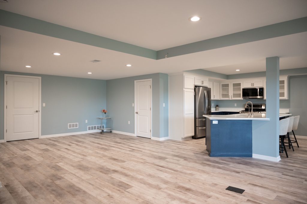 Finished basement kitchen and game area in White Lake, Michigan