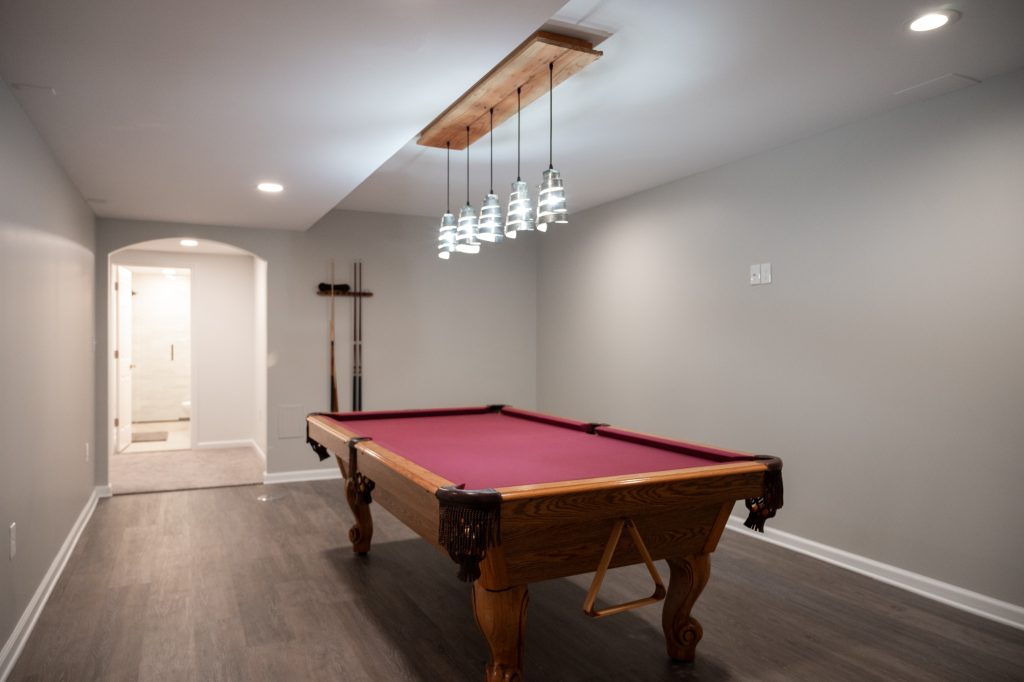 Pool table with drop-down lighting in Canton, MI