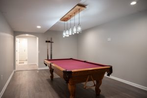 Pool table with drop-down lighting in Canton, MI